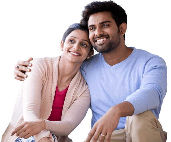 indian man and woman sitting and hugging